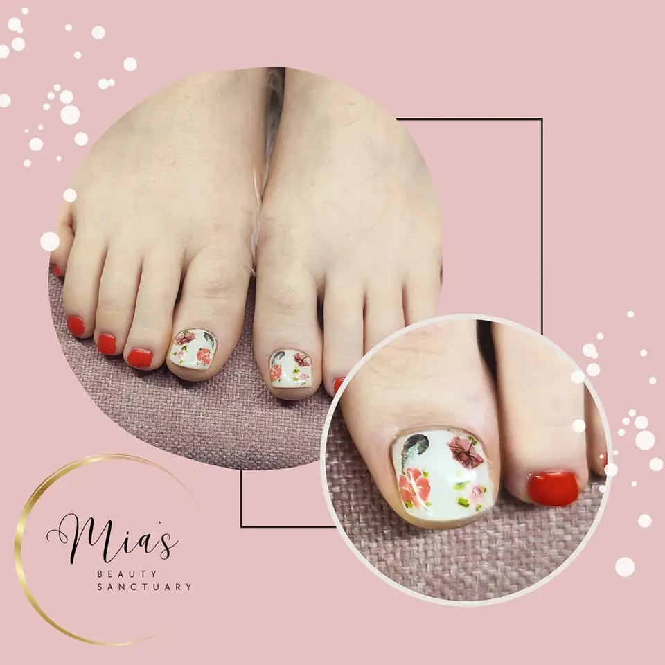 flowers on a milky white base pedicure